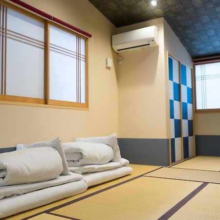 Guesthouse Zennichi Kioto Exterior foto